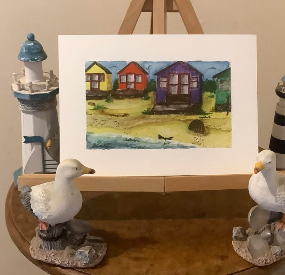 BEACH HUTS AND LOBSTER POT.