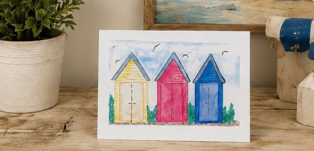 Three Beach Huts Greetings Card